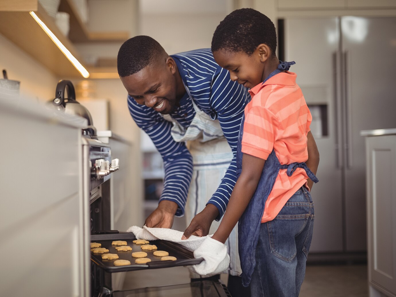 Father and son baking