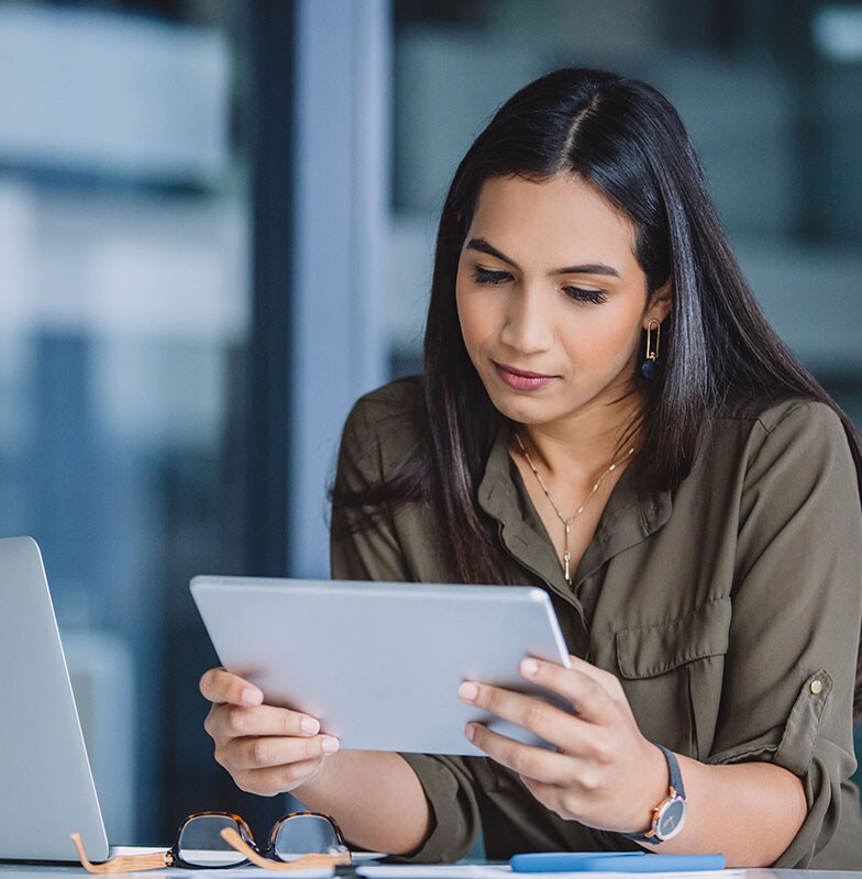 Female surfing on tab